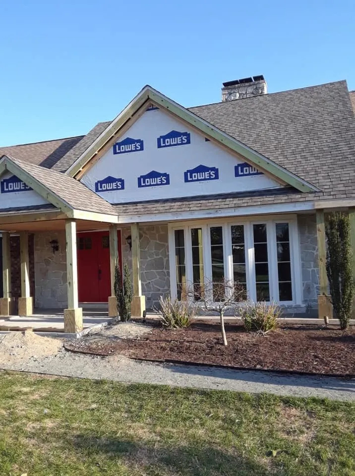 Slide of Little Tiger Roofing