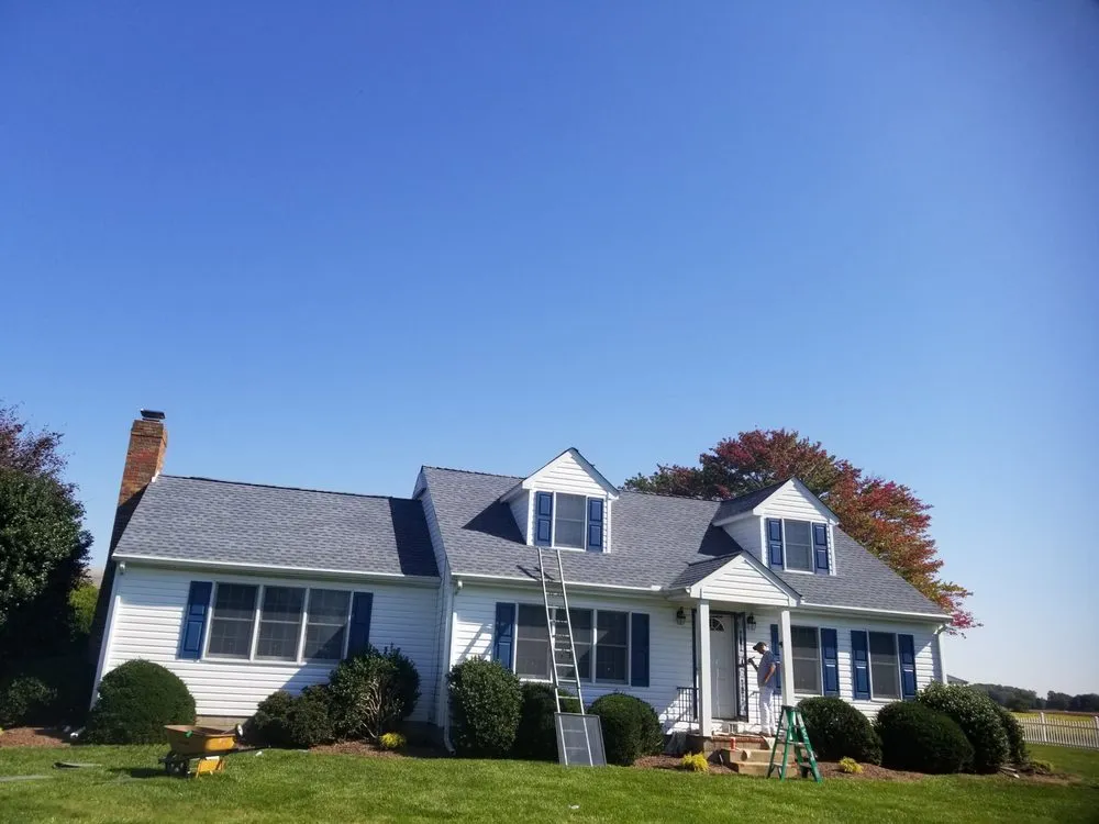 Slide of Little Tiger Roofing