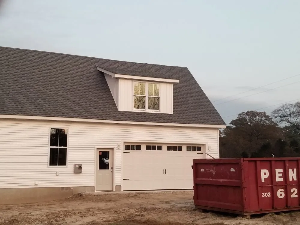 Slide of Little Tiger Roofing