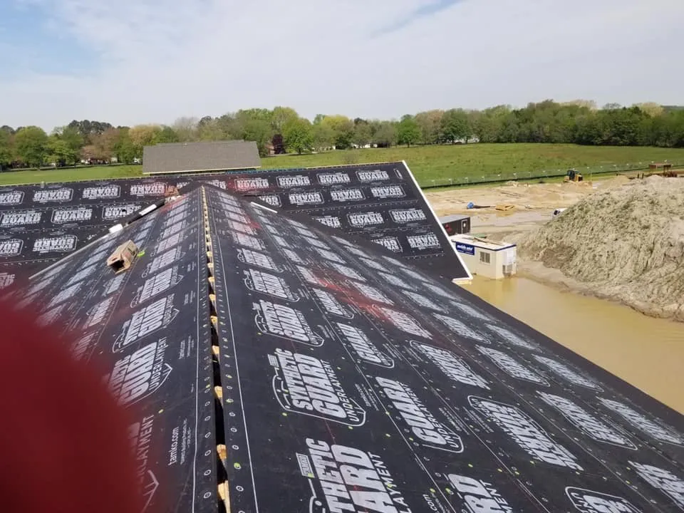 Slide of Little Tiger Roofing