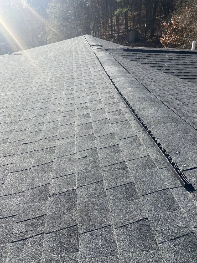 Emergency flat roof repair after storm damage in Long Pond, PA by LJ’s Tree & General Contracting