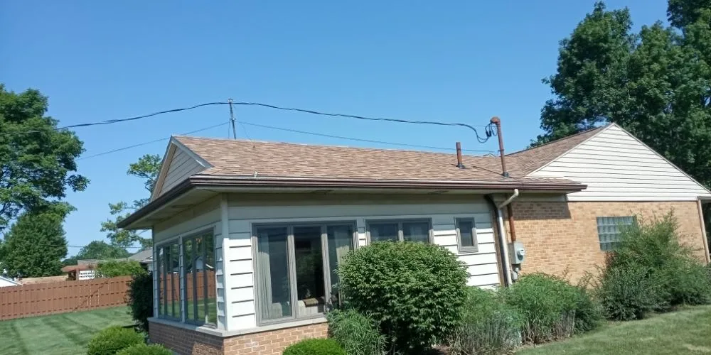 Licensed roof leak repair in Ohio City, OH by L&M Construction