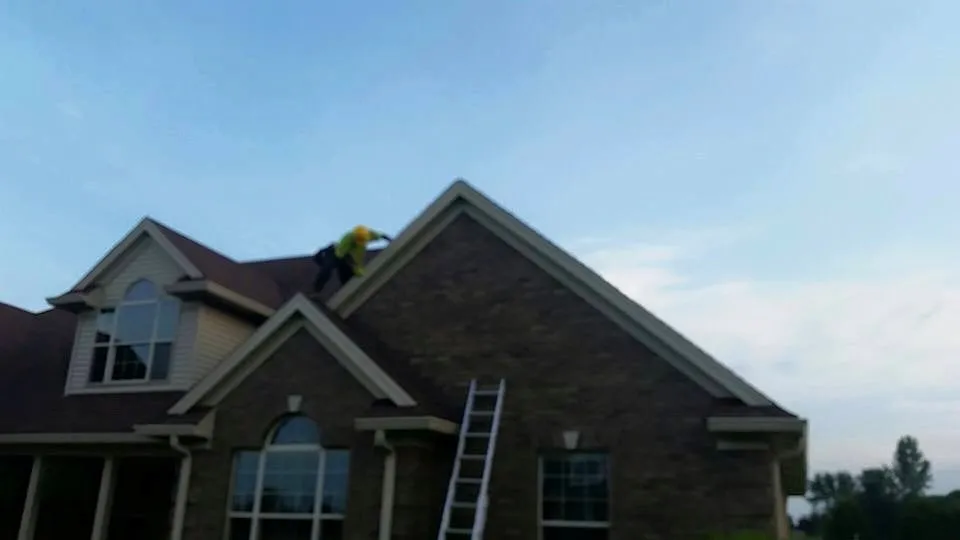 Slide of LM Roofing & Construction