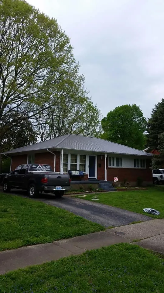 Slide of LM Roofing & Construction