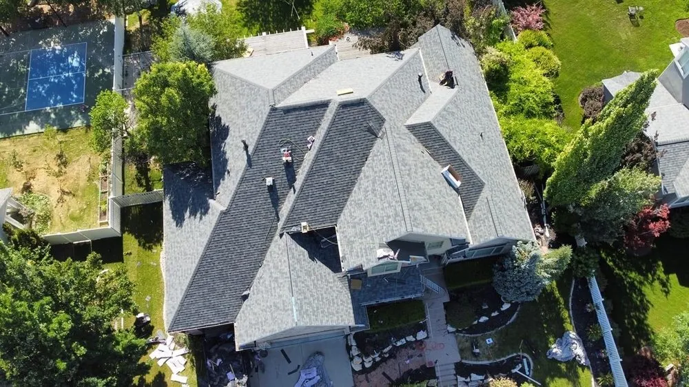 Slide of L&M Roofing