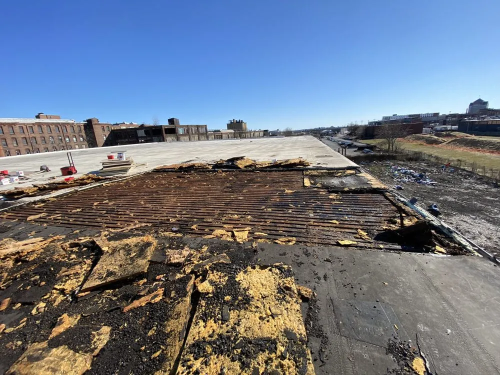 Slide of L.M. Roofing