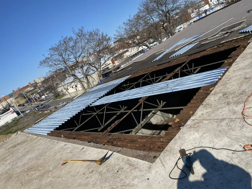 Slide of L.M. Roofing