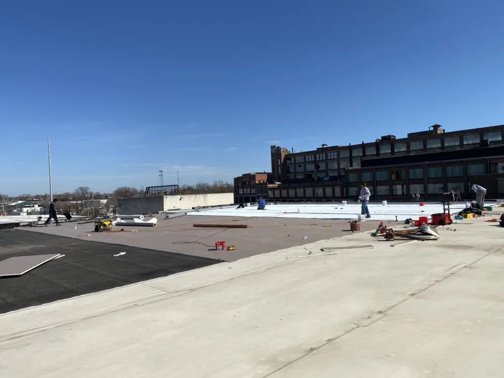 Slide of L.M. Roofing