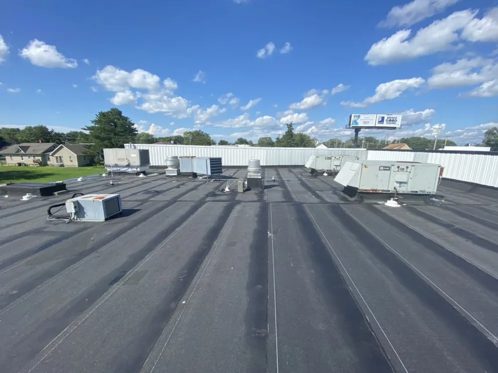 Slide of L.M. Roofing