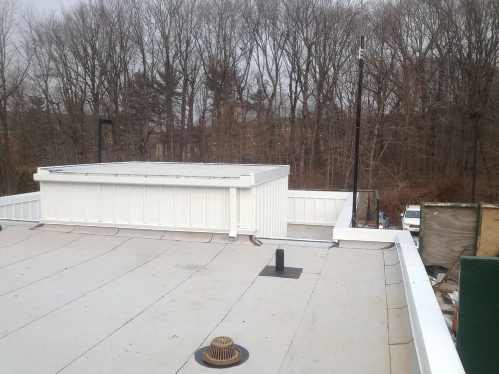 Emergency roof installation in Ridgewood, NY by LMJ Construction
