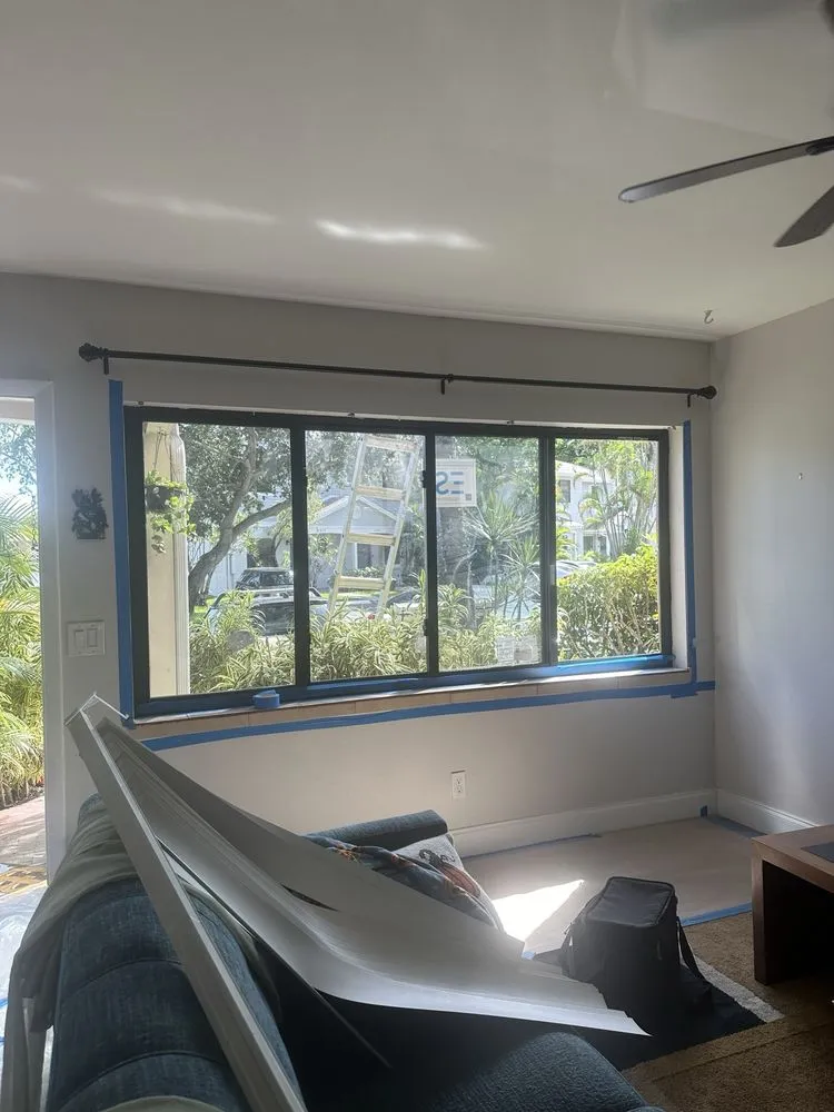 Slide of LockTight Impact Windows Doors & Roofing