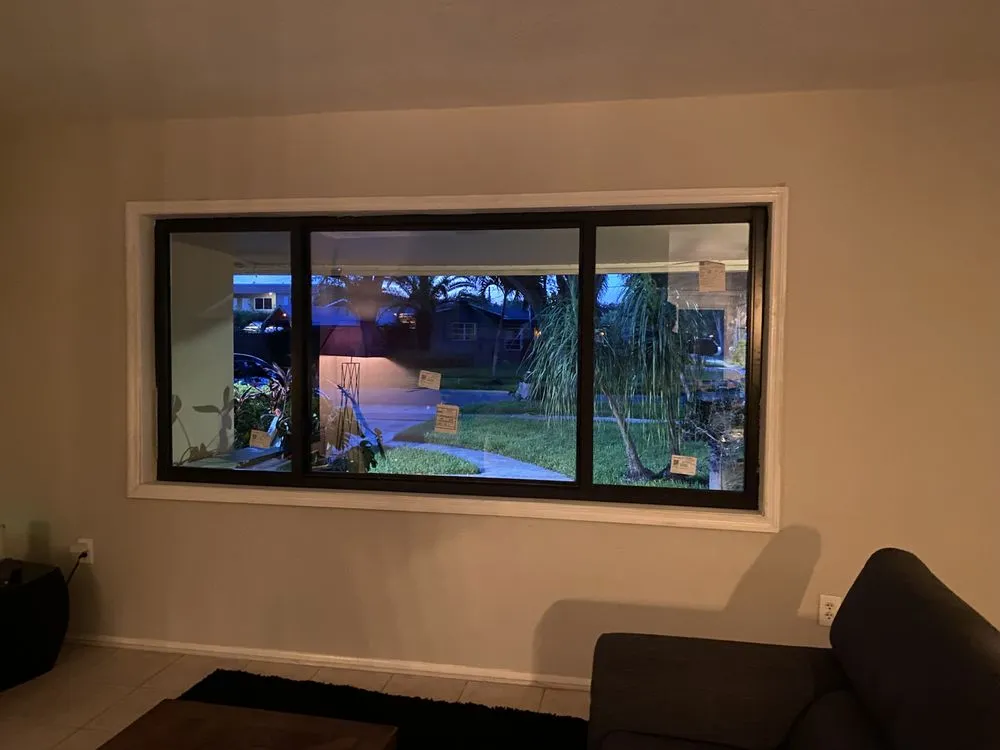 Slide of LockTight Impact Windows Doors & Roofing