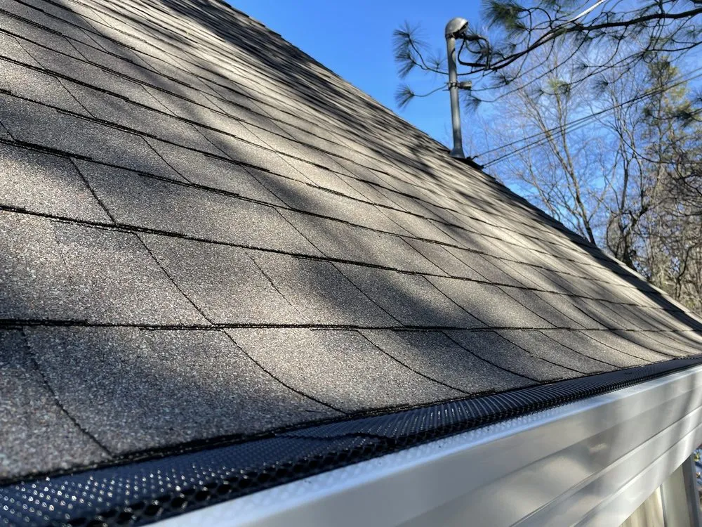 Slide of Logan Roofing