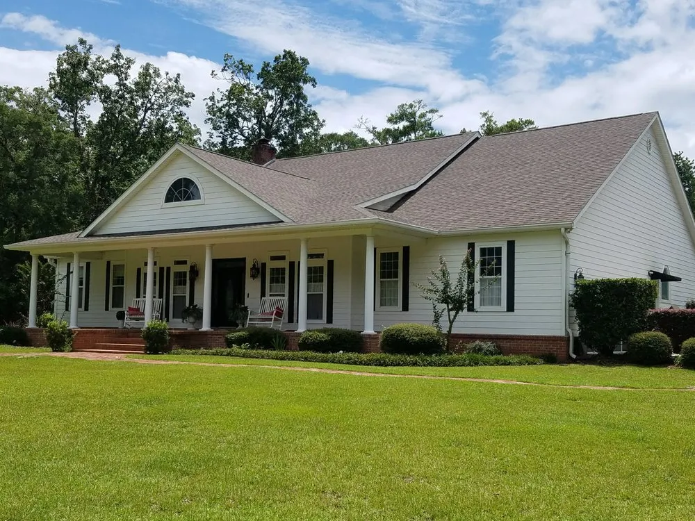 Slide of Logan Roofing