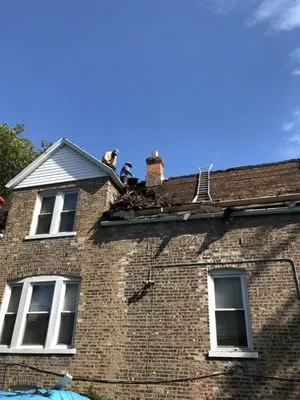 Logan Square Roofing & Tuckpointing Logo