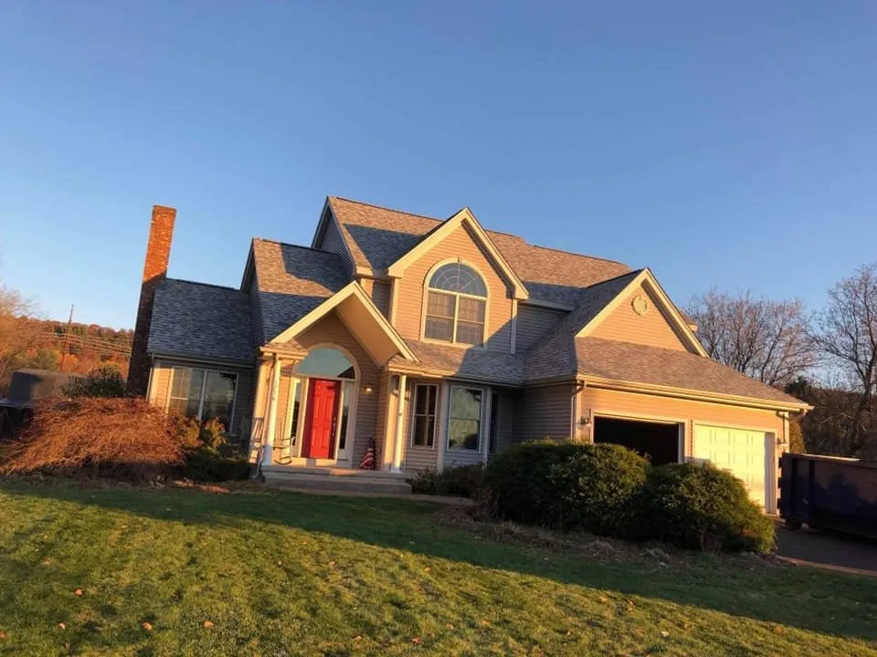 Slide of Loja Roofing & Siding