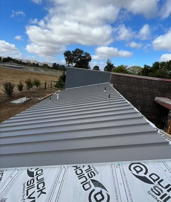 Slide of Loma Blanca Roofing