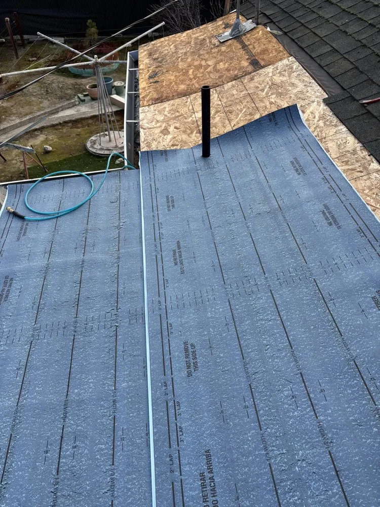 Slide of Loma Blanca Roofing