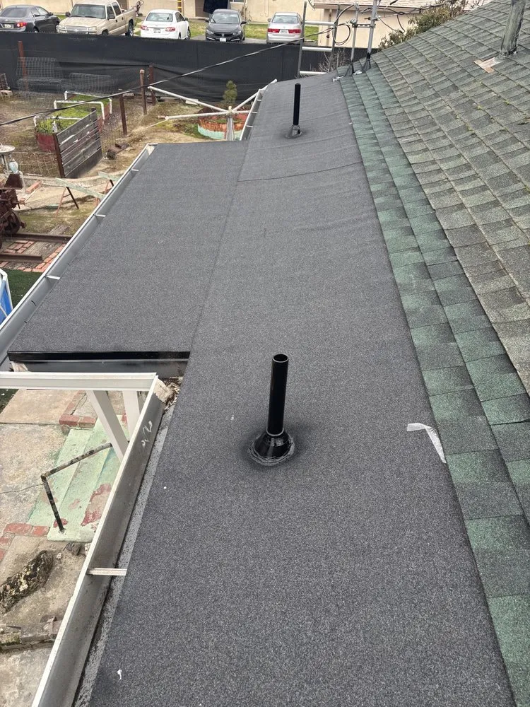 Slide of Loma Blanca Roofing