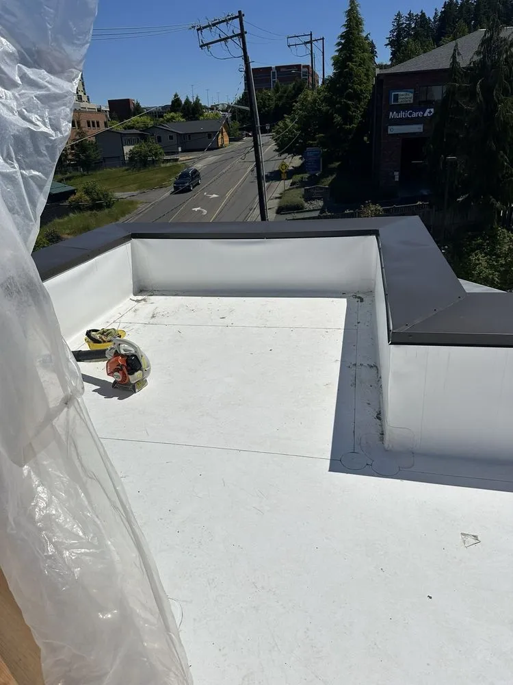 Slide of Lomak roofing