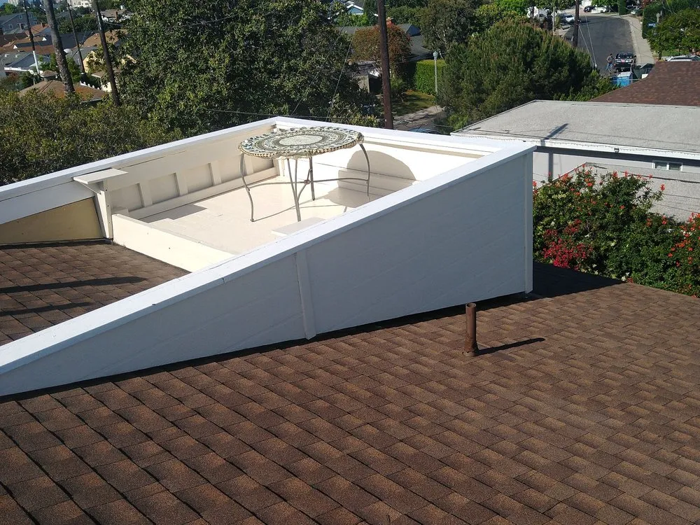 Slide of Lomeli Roofing Co