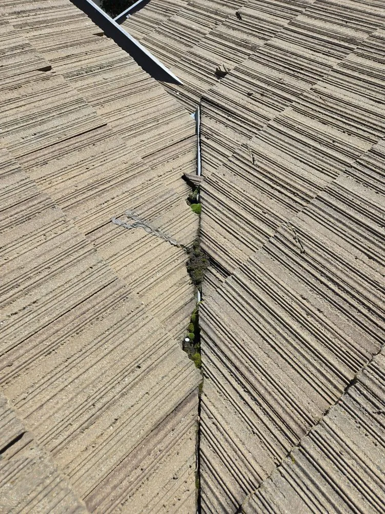 Slide of Lomeli Roofing