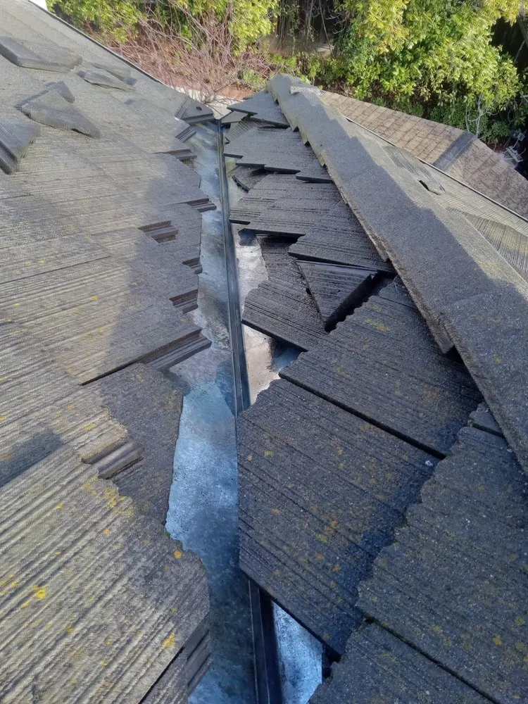 Slide of Lomeli Roofing