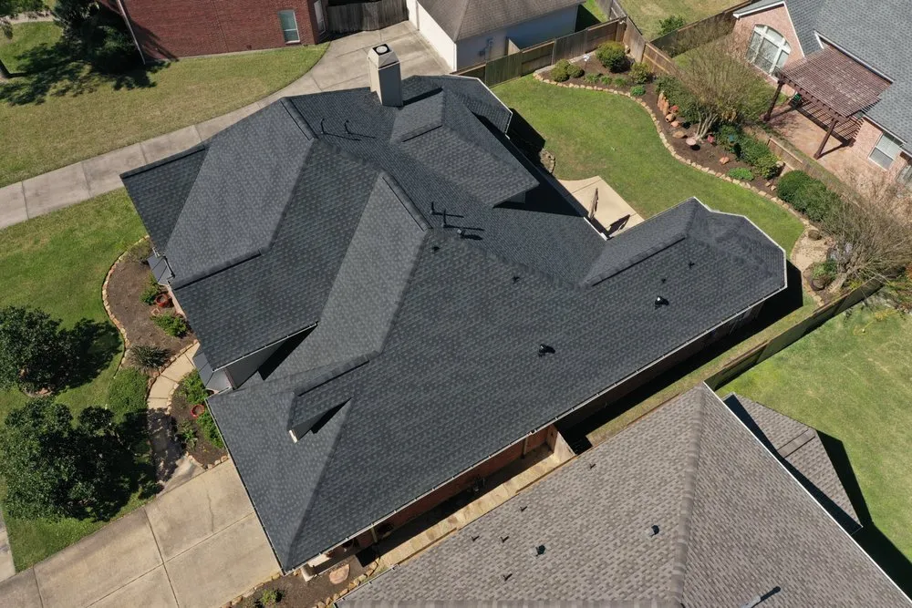 Slide of Lone Star Roofing