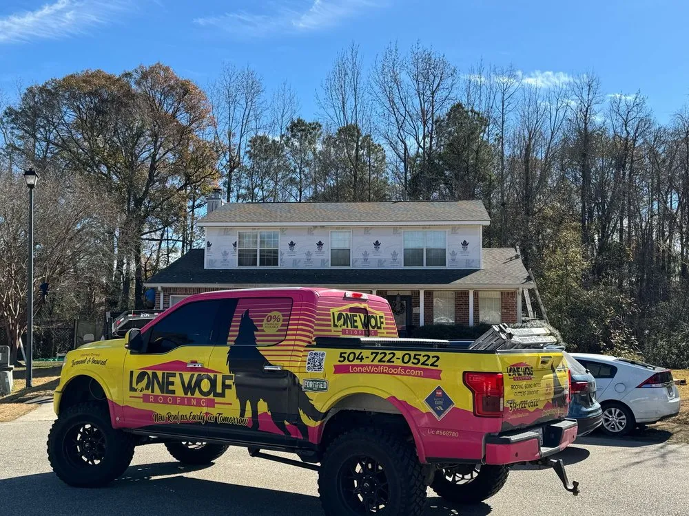 Slide of Lone Wolf Roofing