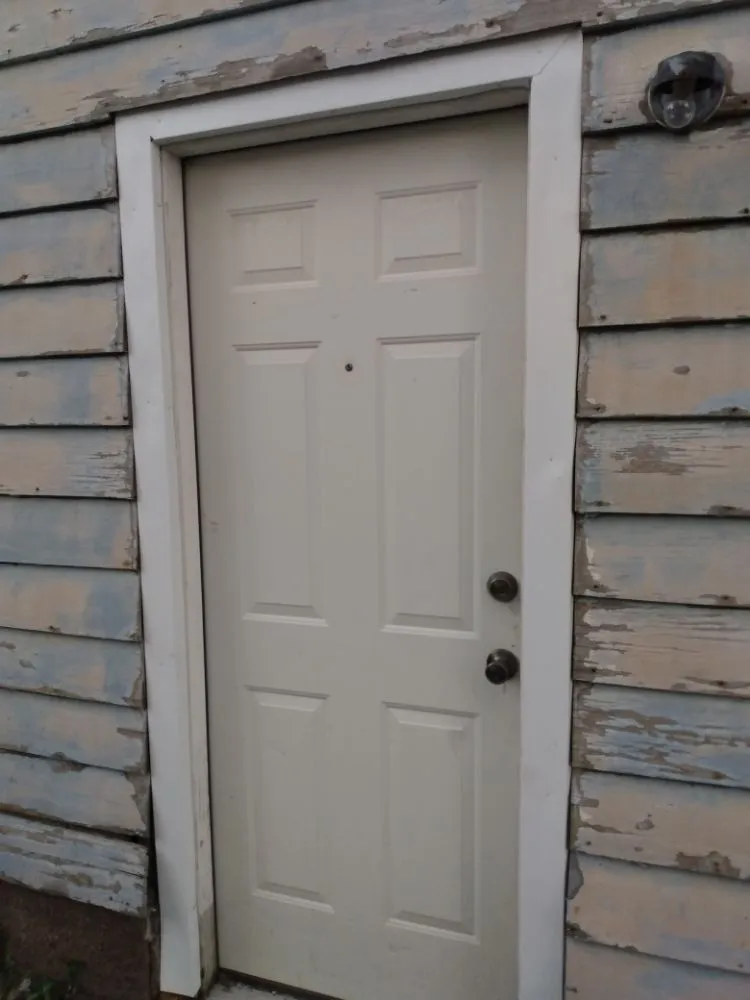 Slide of Lones Exteriors Roofing and Siding