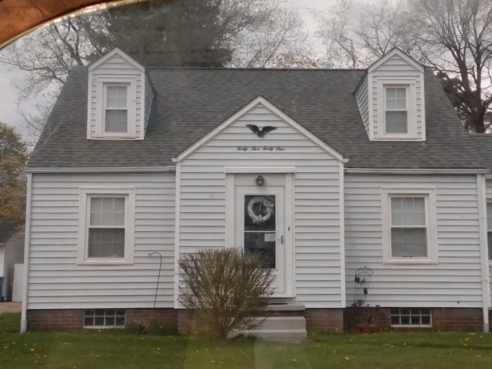 Slide of Lones Exteriors Roofing and Siding