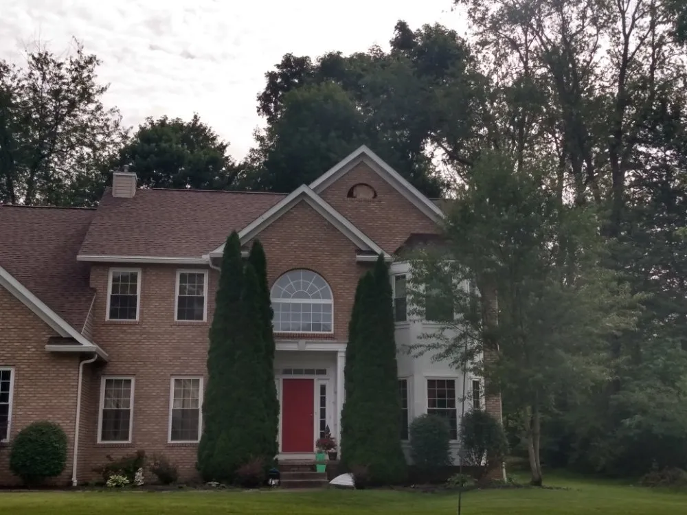 Slide of Lones Exteriors Roofing and Siding