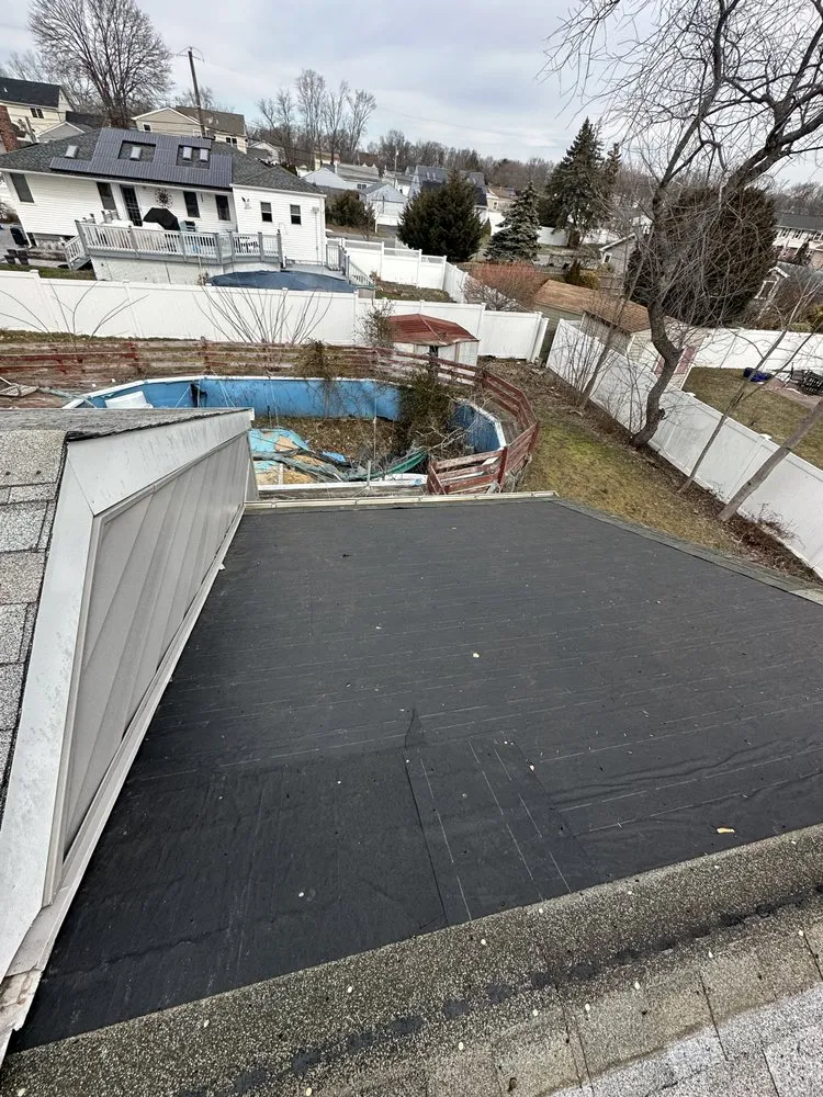 Slide of Long Island Prestige Roofing and Chimney