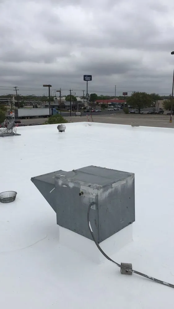 Slide of Longhorn Commercial Roofing