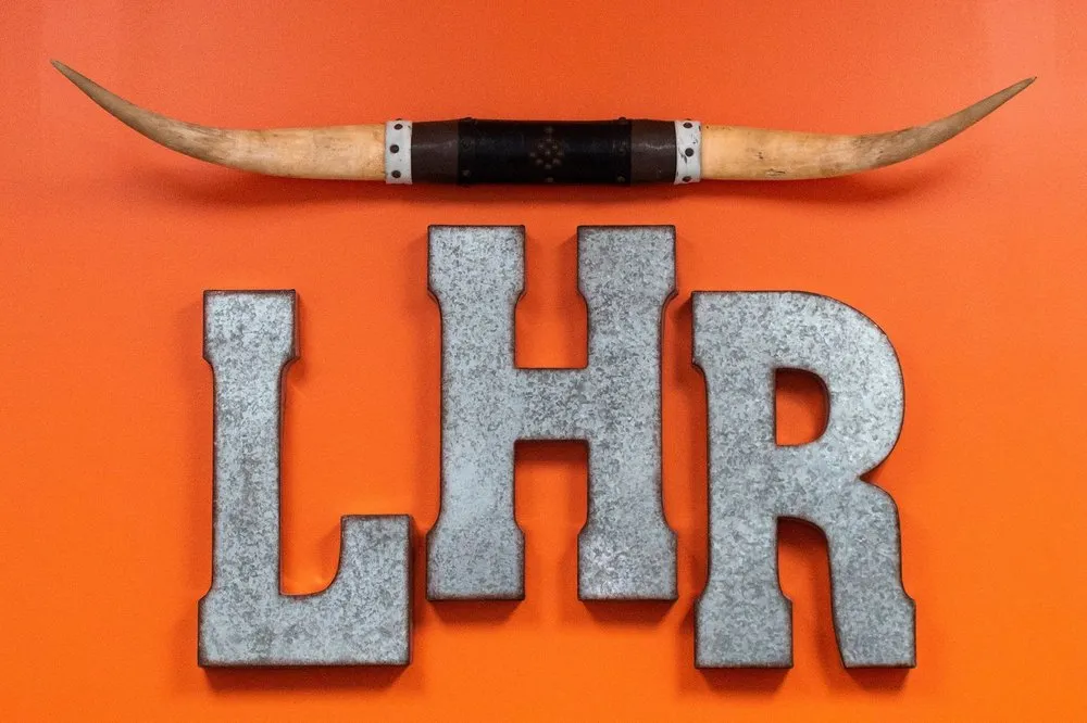 Slide of LongHorn Roofing