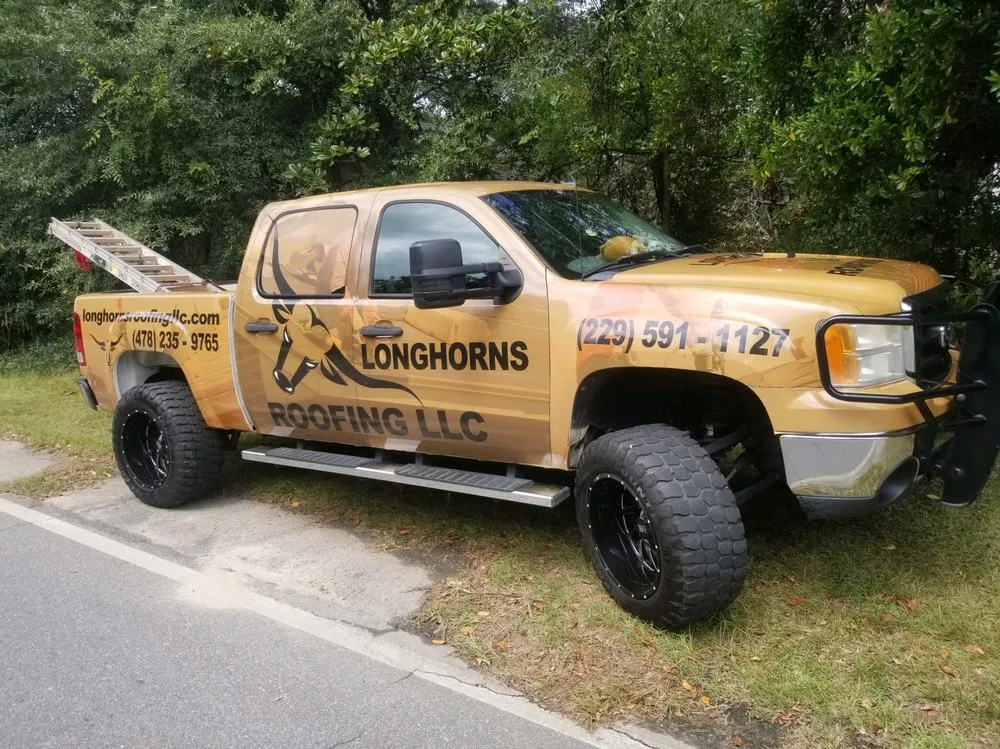 Slide of Longhorns Roofing