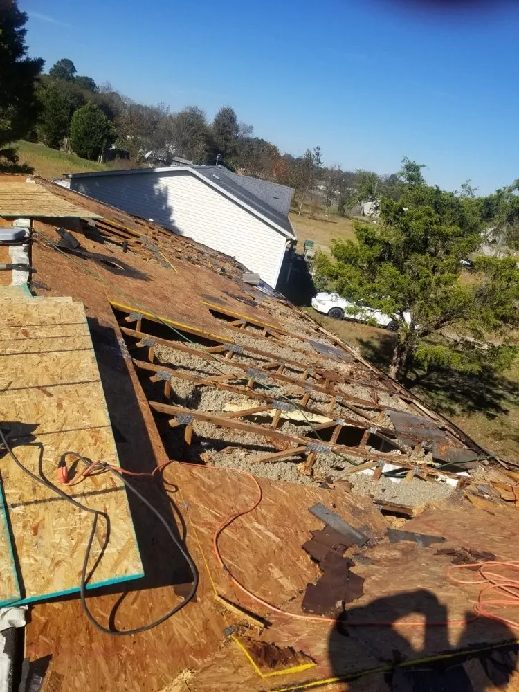 Slide of Longhorns Roofing