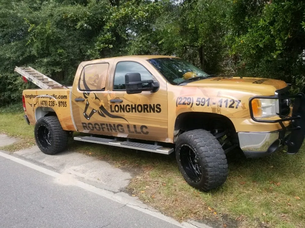 Slide of Longhorns Roofing