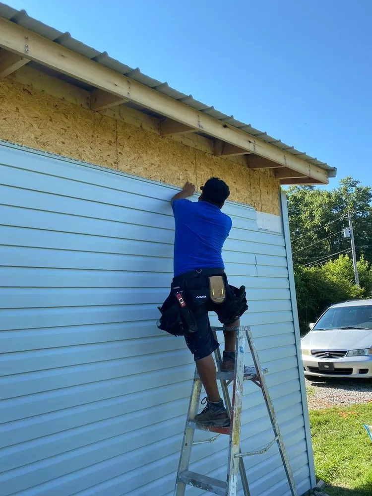 Emergency storm damage roof repair after storm damage in Bloomington Springs, TN by Lopez