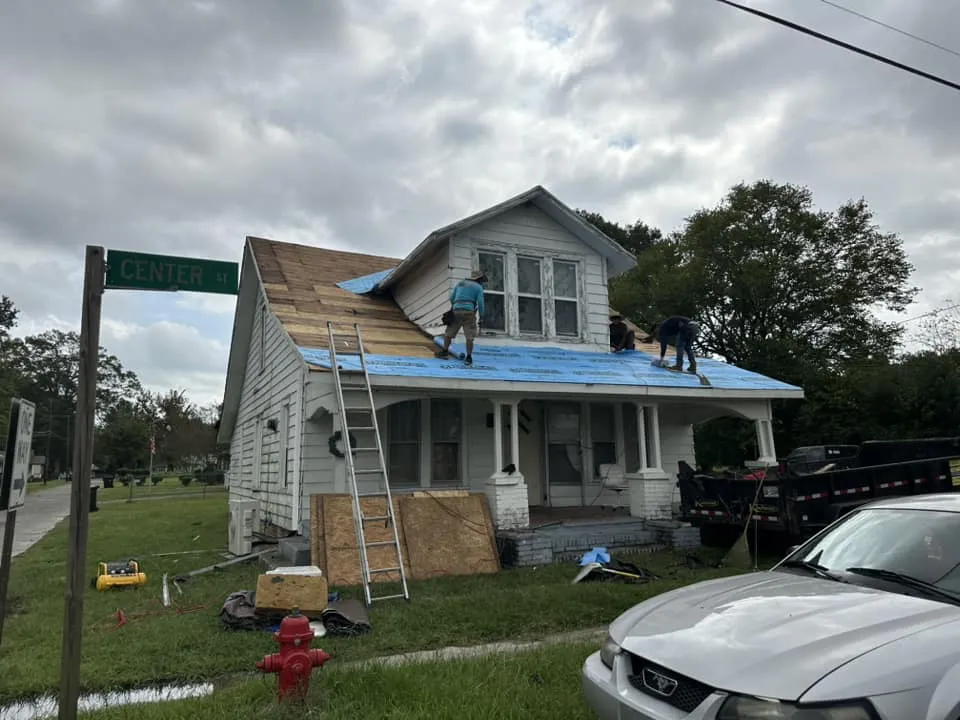 Slide of Lopez Brothers Roofing