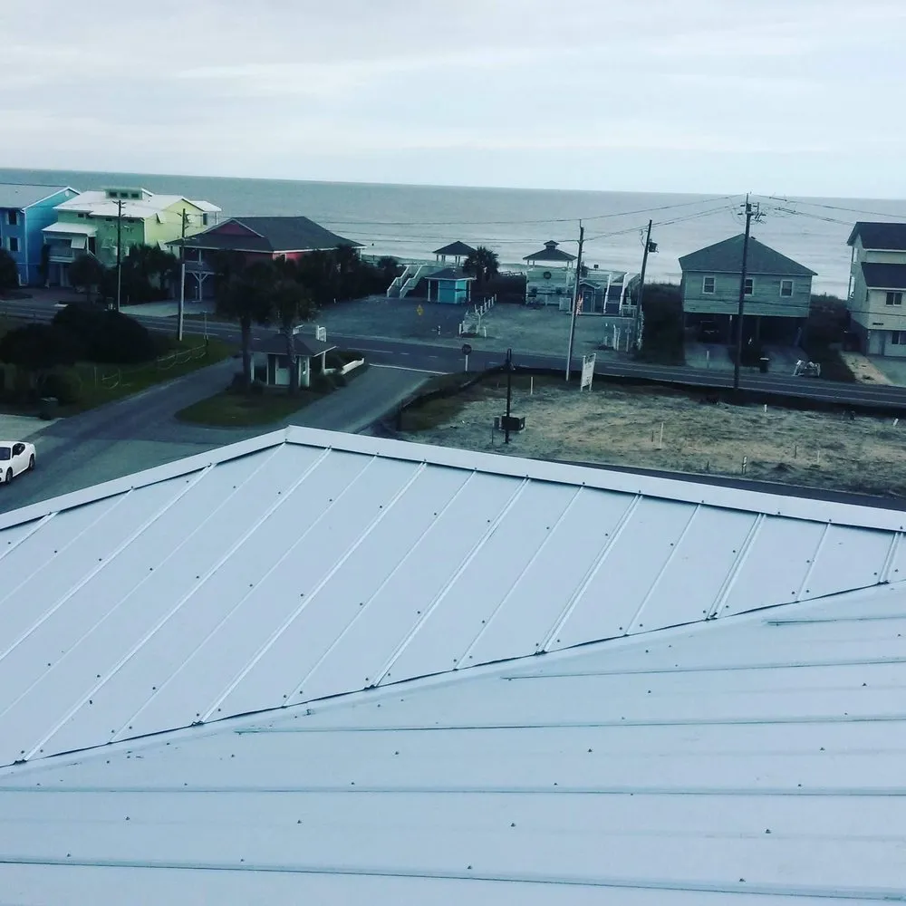 Slide of Lopez Metal Roofing