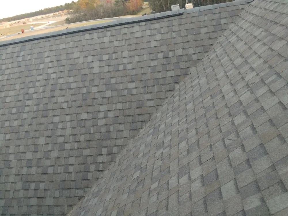 Slide of Lopez Metal Roofing