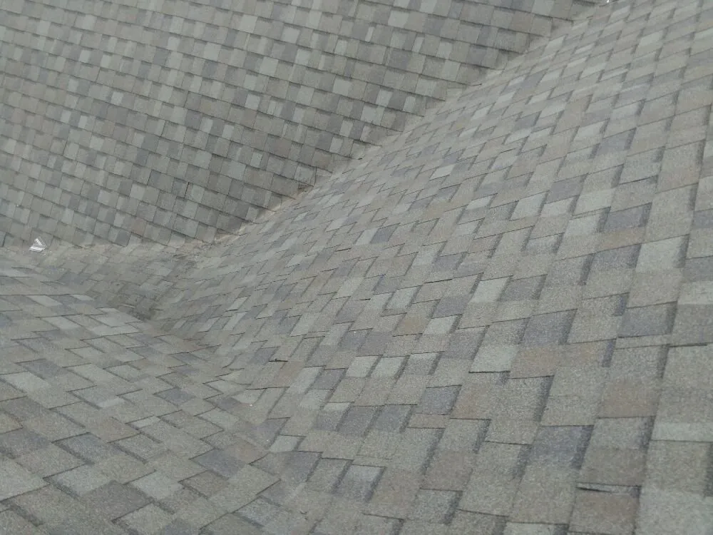 Slide of Lopez Metal Roofing