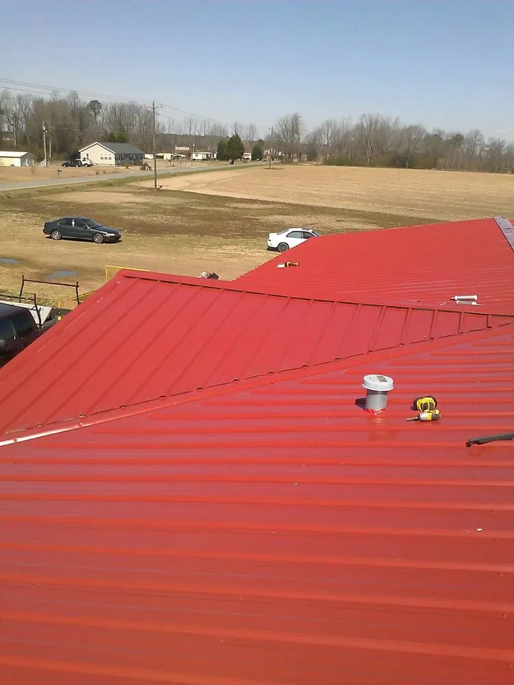 Slide of Lopez Metal Roofing