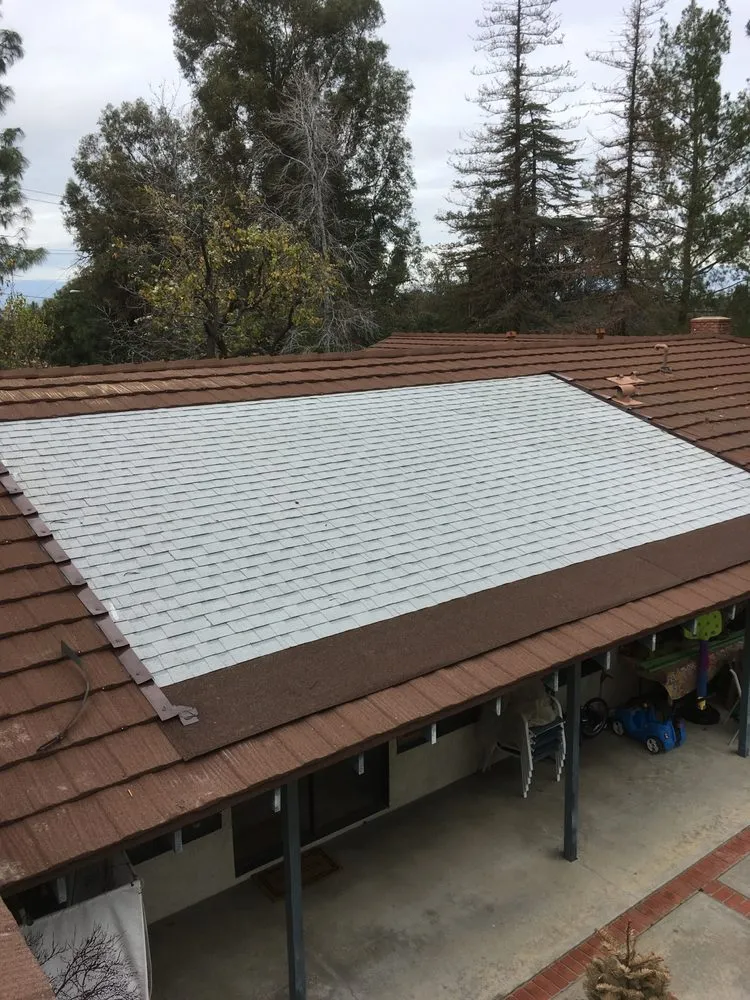 Slide of Lopez Roofing & Construction