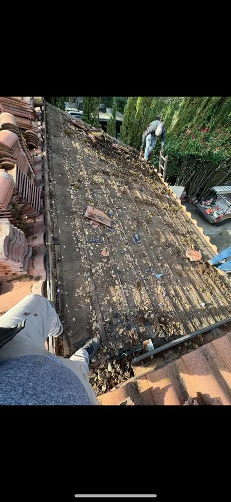 Slide of Lopez Roofing