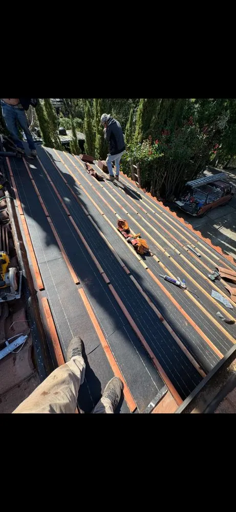 Slide of Lopez Roofing