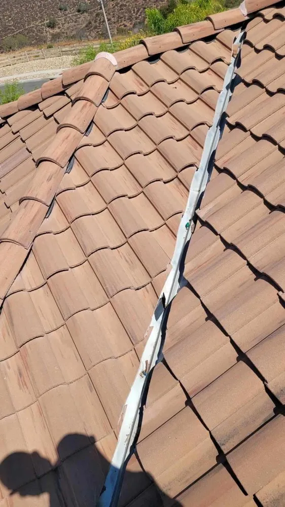 Slide of Lopez Roofing