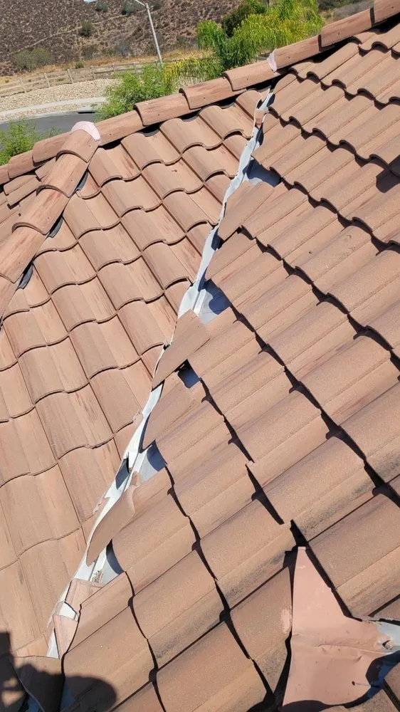 Slide of Lopez Roofing