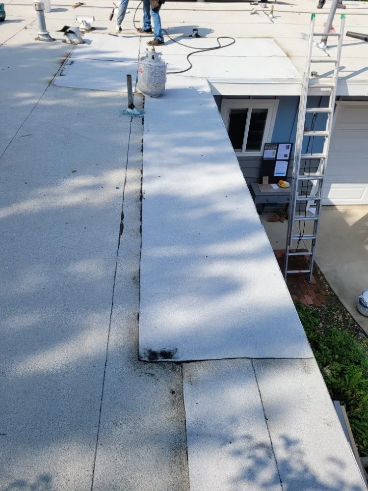 Slide of Lopez Roofing